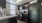 Kitchen with brown cabinets and black appliances