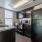 Kitchen with brown cabinets and black appliances