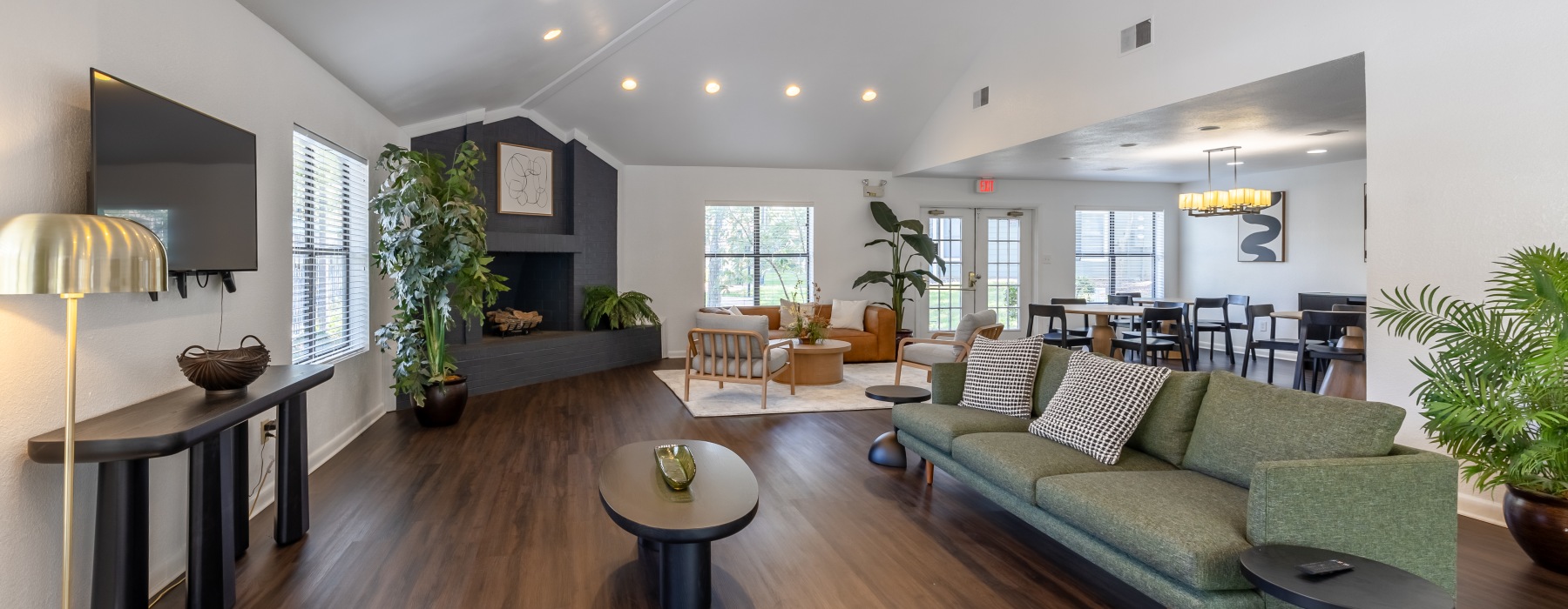 Styled clubhouse with black fireplace
